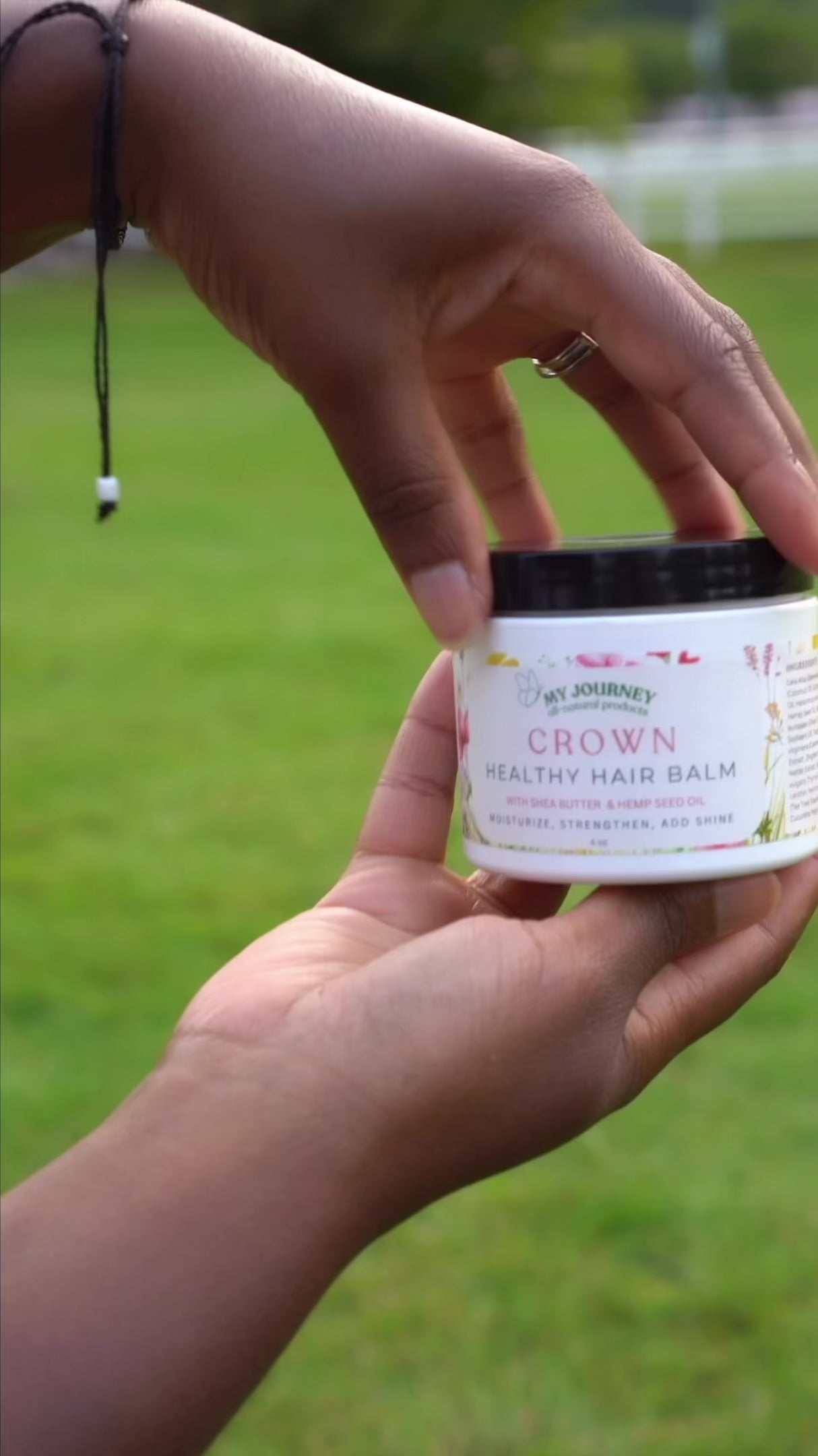 video of women doin here hair using My journey Crown Healthy Hair Balm